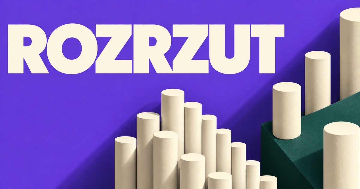 Kremowy napis ROZRZUT na fioletowym tle, kremowe matowe walce stojące w dwóch rozstawach.